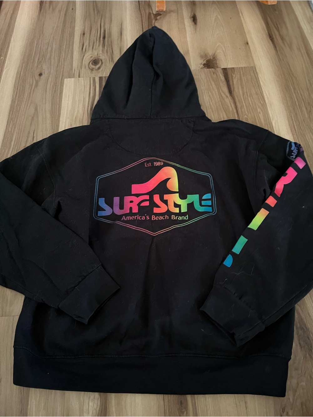 Surf style Y2K black hoodie size Medium with multicolor rainbow spellout